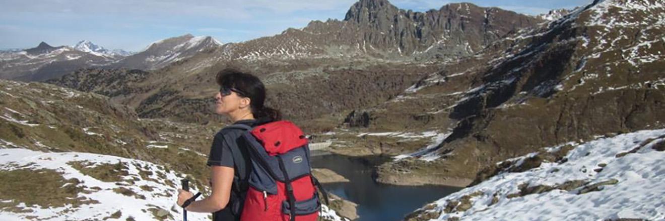 Woman hiker in mountain landscape